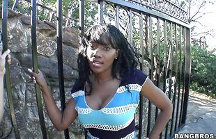 Topnotch chick Nyomi Banxxx with round tits is gently sucking a rock hard schlong hoping that no one will see her
